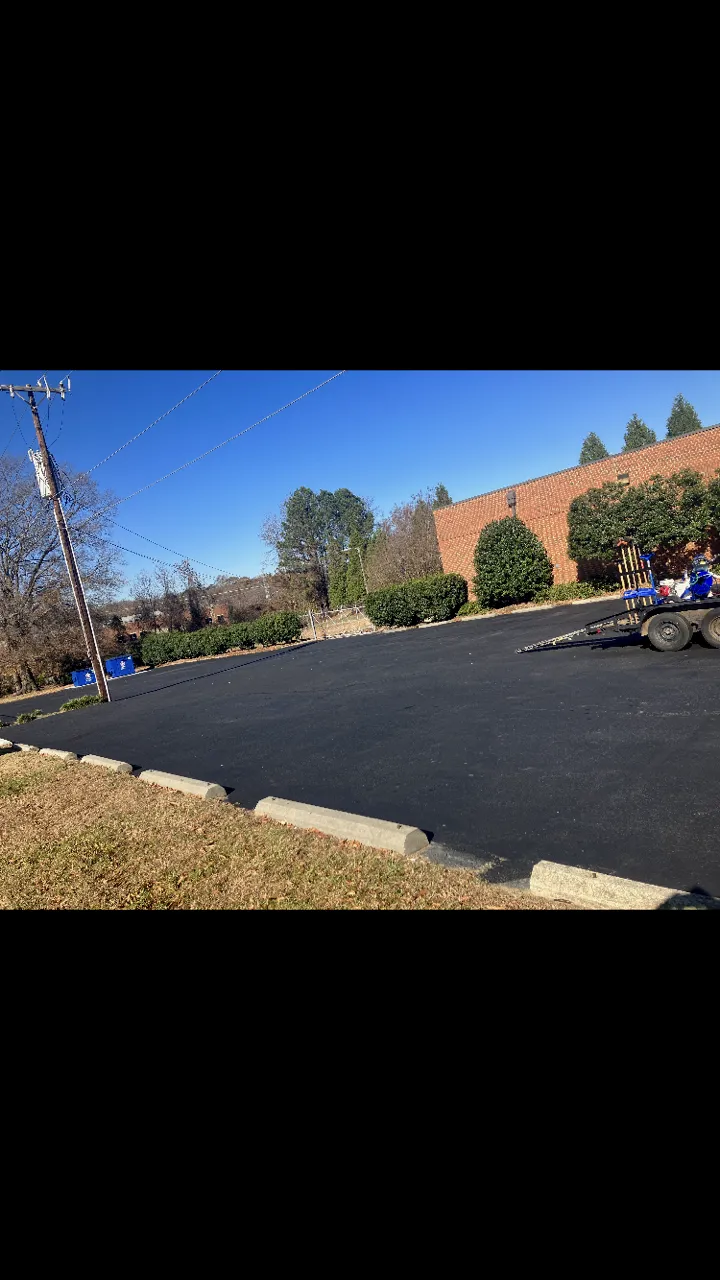 Freshly striped parking lot with clear markings in Greensboro NC